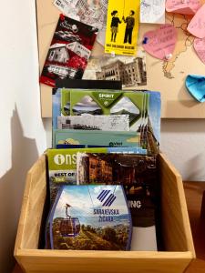 a wooden crate filled with different boxes on a table at Apartment Liriq - Free Parking in Sarajevo