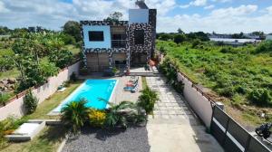 an aerial view of a house with a swimming pool at VR Villa in Trou d'Eau Douce