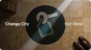 a tile floor with a sign that reads change city not hotel at Hotiday Room Collection - Stresa in Stresa