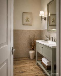 a bathroom with a sink and a mirror at The Lister Arms in Malham +66 photos