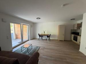 a living room with a couch and a table at FeWo Alissa in Nordrach