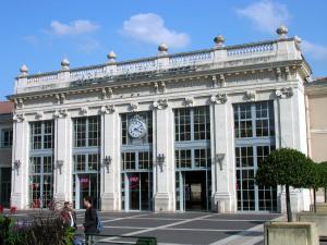 a building with a clock on the front of it at L'adorable in Valence