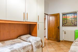 a bedroom with a bunk bed in a room at Casa Luana in Lucignano