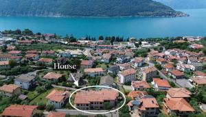 an aerial view of a town with a house at Dolce Vita LakeView - By Turidea in Sale Marasino