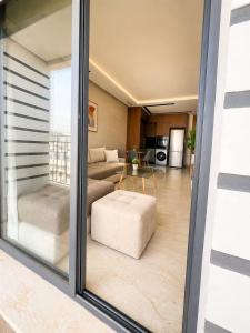 a living room with a view of a living room at Premium studio Casablanca in Maarif