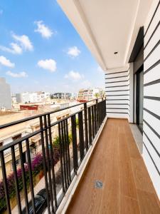 a balcony with a view of the city at Premium studio Casablanca in Maarif