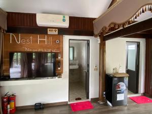 a entrance to a restaurant with the door open at Nest hill retreat in Mù Cang Chải