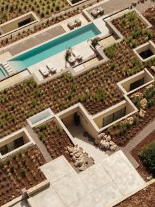 an aerial view of a house with a swimming pool at Gaia Place in Agios Nikolaos