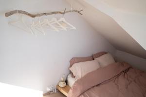 a small bedroom with a bed in a attic at Solhaven in Selfoss
