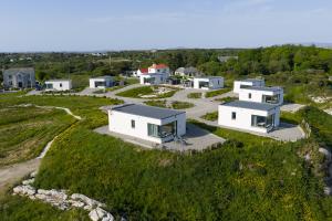 an aerial view of a house on a hill at Coastal Escape in Burtonport