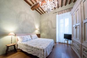 Postel nebo postele na pokoji v ubytování B&B La Zuppa Inglese