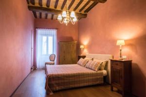 Postel nebo postele na pokoji v ubytování B&B La Zuppa Inglese