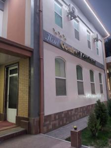 a building with a sign that reads hotel covenant coalition at Comfort Continent in Oktyabrʼ
