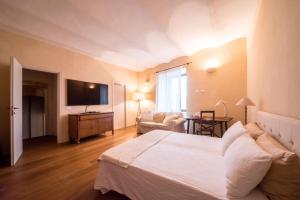 Postel nebo postele na pokoji v ubytování B&B La Zuppa Inglese