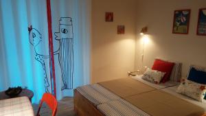 Posteľ alebo postele v izbe v ubytovaní Daniil's Seafront Apartment
