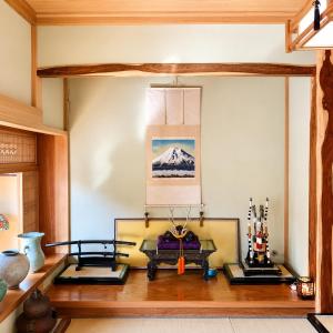 a room with a table and some items on a wall at STAY FUJI a in Yamanakako +9 photos
