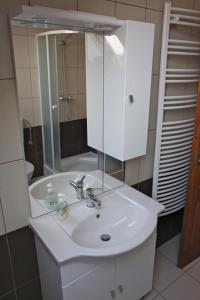 Kúpeľňa v ubytovaní Szabolcs Apartments