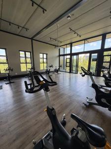 a gym with a bunch of exercise bikes in it at The Precinct Lifestyle in Midrand