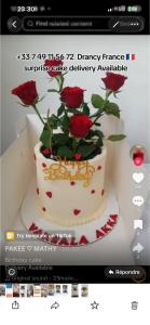 a picture of a cake with roses on it at Saro in Lourdes