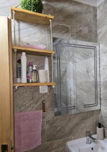a bathroom with a sink and a mirror at Oasis of Peace in Cetinje +52 photos