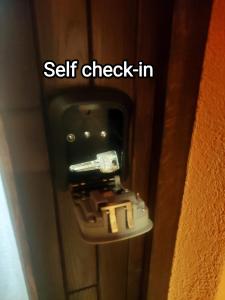 a self checked in toilet in a bathroom stall at Apartman LIPA-Lipovac Bajakovo! Parking,Wi-Fi in Lipovac