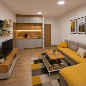 a living room with a couch and a table at Apartman Trifko in Pale