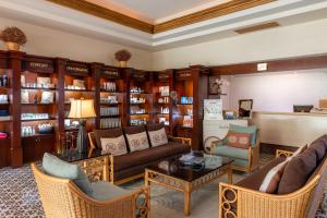 a living room with a couch and chairs and a table at Pueblo Bonito Emerald Bay Resort & Spa - All Inclusive in Mazatlán