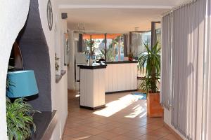 The lobby or reception area at Hotel Aquarius