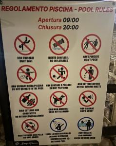a sign in a supermarket warning of the dangers of performingasy at Tuscany Hill in Gambassi Terme