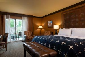 a hotel room with a bed and a window at Wayfinder Bishop in Bishop +114 photos