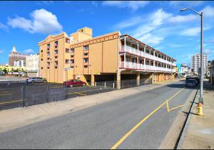 an empty street with a building on the side of the road at Super 8 by Wyndham Atlantic City in Atlantic City