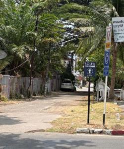 a street sign on the side of a road at SOLEIL HAUS - Huahin in Hua Hin