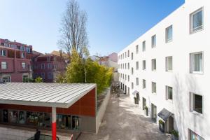 an overhead view of a building in a city at Apartment Carmo in Lisbon
