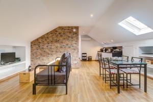 a kitchen and dining room with a table and chairs at Home Out Rooms & Apartments in Lisbon +226 photos