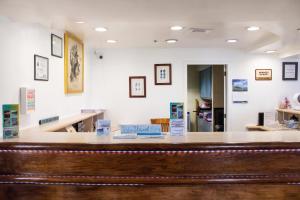 a bar in a waiting room with a counter at Hatteras Island Inn in Buxton +42 photos
