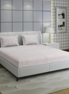 a white bed in a white room with a bed frame at बिश्नोई भवन in New Delhi