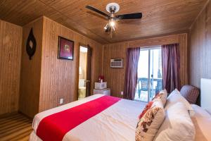 Cama o camas de una habitación en The Wisconsin Wood Inn