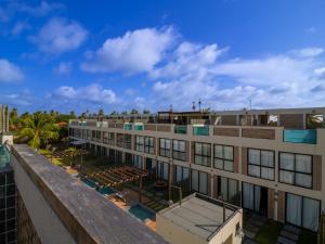 an exterior view of a building with a pool at Villa 18 Atins Rooftop com piscina in Barreirinhas