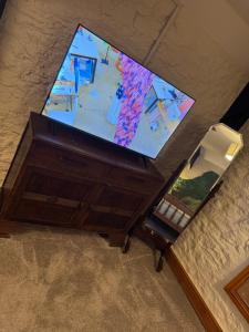 an overhead view of a flat screen tv on a table at The Loft in Nantgaredig +2 photos