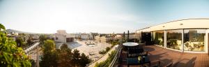 a building with a view of a city at Penthouse Centrum Nitra Jacuzzi&View, free parking in Nitra +153 photos