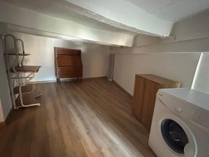 a laundry room with a washer and dryer at Sibillini Dream House in Amandola