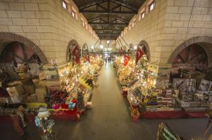 an indoor market with christmas lights in a building at Kestanbol Hotel in Çanakkale