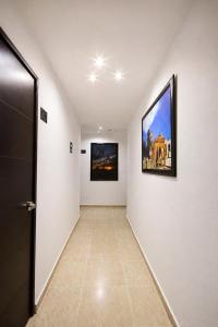 TV a/nebo společenská místnost v ubytování First Inn Hotel & Business