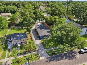 an overhead view of a house with a yard at Amazing 2BR Queen 8mins SODO & 4mins ORMC in Orlando