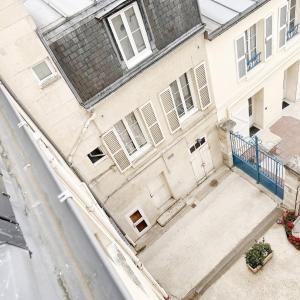 an overhead view of a building with a balcony at C34-Panorama in Chantilly