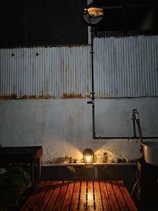 a room with a room with a fire in the floor at Kingfisher Lodge in Shodoshima