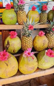 a bunch of fruit sitting on a shelf at Oceanfront, AC and Parking, La Punta in Paso Hondo