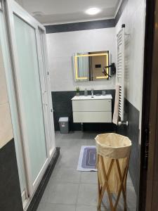 a bathroom with a sink and a mirror at Suite cobalt suite nova suite évasion in Mostaganem +107 photos