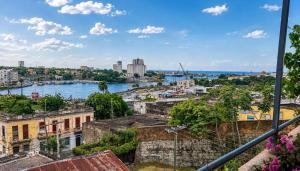 a view of the city from a building at Hostal Santa Barbara in Santo Domingo