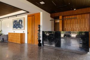 a large room with a large aquarium in the middle at Ecoverse Resort & Residence by OXO - Nyanyi Beach, Bali in Cemagi +86 photos